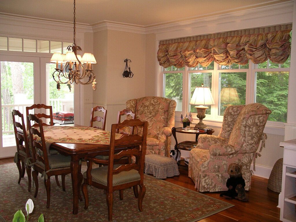 antique living room with table and chandelier