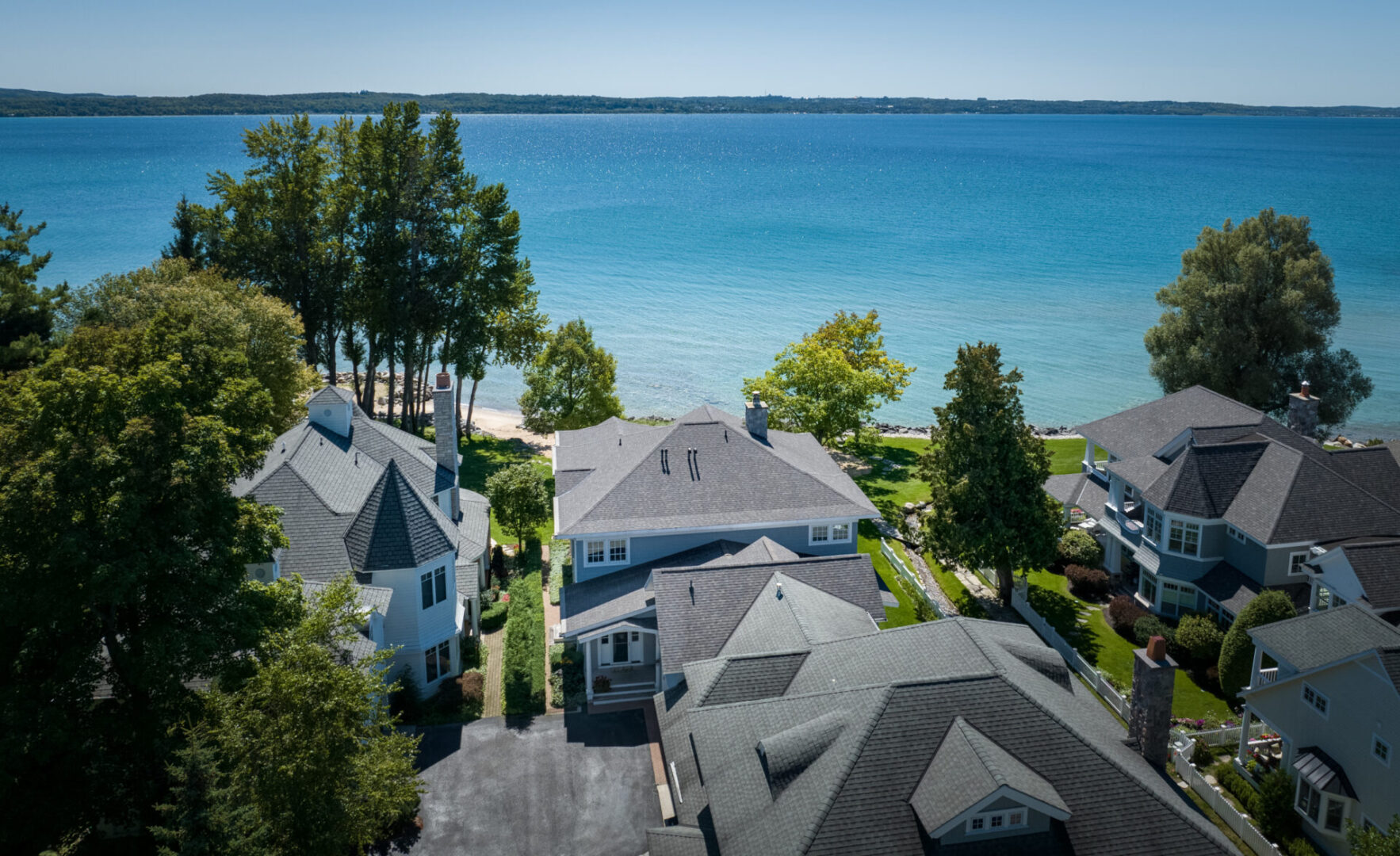 Kimble + Kimble Drone View of House Looking At Lake