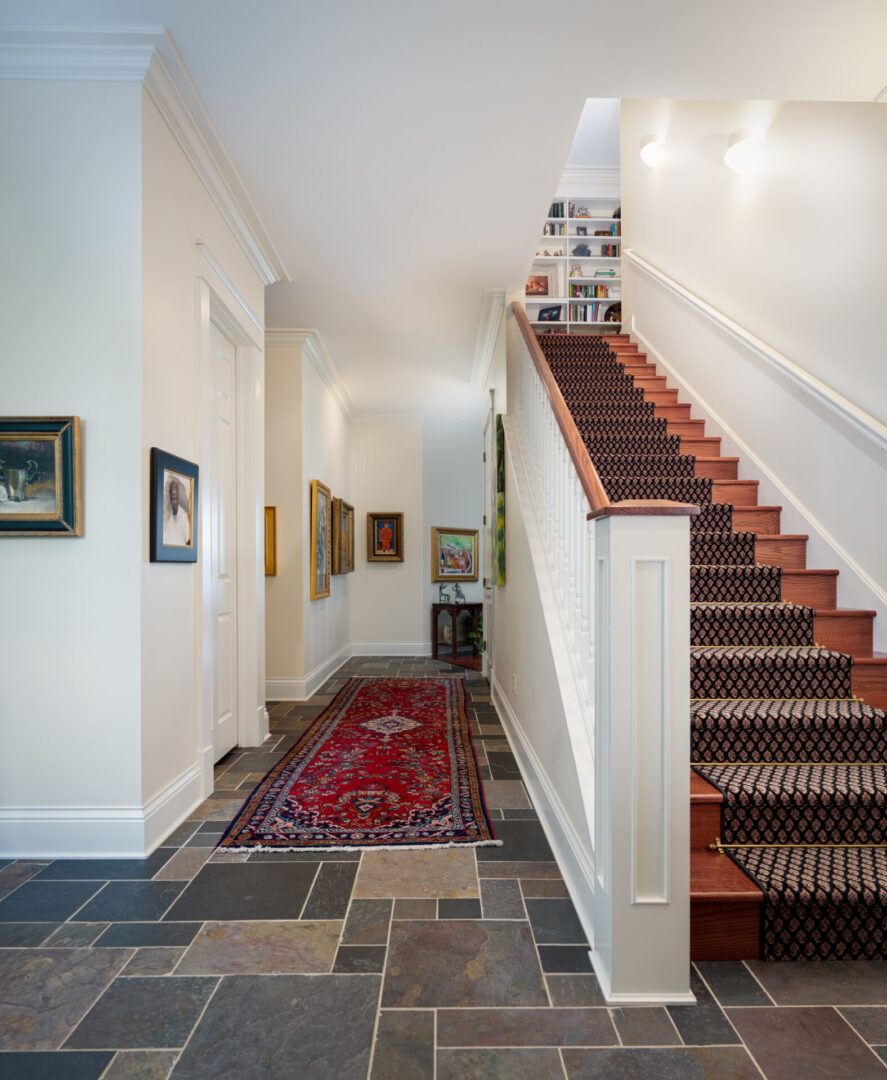 Kimble + Kimble Hallway with Steps and Artwork