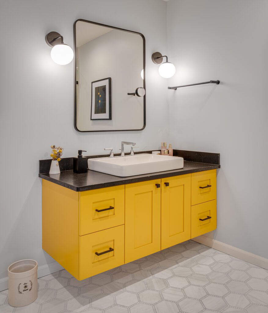 Kimble + Kimble Master bathroom with Yellow Vanity